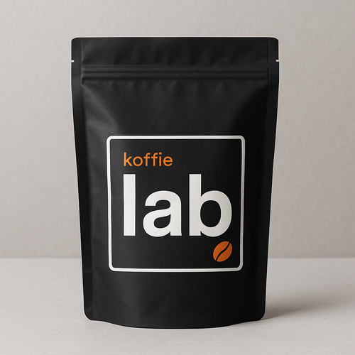 Black coffee packaging with 'koffie lab' branding on a neutral background